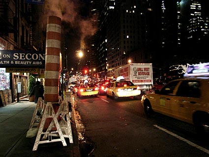 Second Avenue scene. Night photographs on the streets of New York, NYC, December 2006