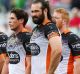 Faces tell a story: The Tigers gather behind their own try line after another Canberra try on the weekend.