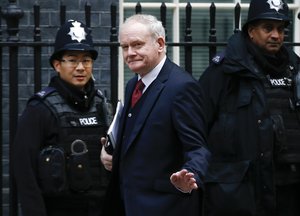 In this Oct. 24, 2016 file photo, Northern Ireland's deputy First minister Martin McGuinness arrives to Downing Street, for a meeting with Britain's Prime Minister Theresa May, and the Brexit Secretary David Davies about Britain's decision to leave the EU in London.