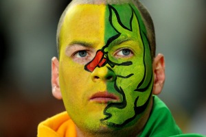 A Wallaby fan has his warpaint on.