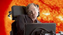 Stephen Hawking in front of sun with coronal mass ejections. Emailing: July_Discovery_Into The Universe With Stephen ...