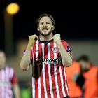 Ryan McBride in the thick of a match with his beloved club Derry City