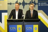 The heat is being turned up on the CPA Australia board and CEO Alex Malley, left, seen here with ASIC boss Greg Medcraft.