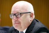 So close, he can almost taste it ... Attorney-General (and aspirant temporary UK resident), George Brandis.