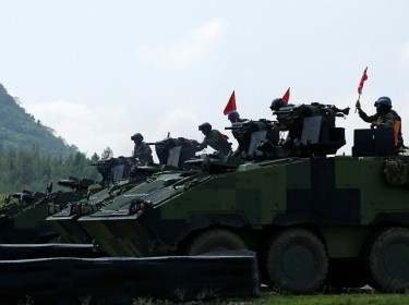 Soldiers drive a CM33 Clouded Leopard infantry fighting vehicle during the annual Han Kuang military drill simulating the PLA invading the island, in southern Taiwan, August 25, 2016