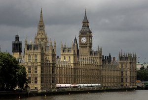 Storm clouds over The Houses of Parliament on the river Thames in London, Thursday July 26, 2007.