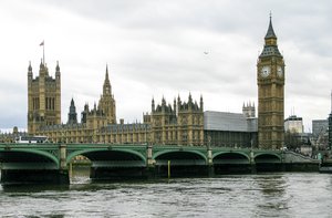 London: Westminster Bridge, Elizabeth Tower and (in the background) Houses of Parliament. United Kingdom, EU.