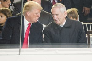 President Donald J. Trump and newly appointed Secretary of Defense James Mattis watch as parade participants march past the White House reviewing stand during the 58th Presidential Inauguration Parade in Washington D.C., Jan. 20, 2017