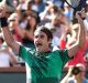Roger Federer enjoys the moment after defeating Stan Wawrinka in the men's final of the BNP Paribas Open at Indian Wells.