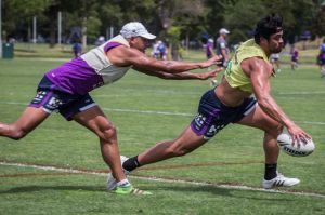 Melbourne Storm winger Young Tonumaipea dots down during a training session.