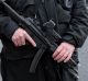 Armed officers attend to the scene outside Westminster Bridge.