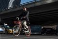 A rider on a Mobike in Beijing. Mobike and Ofo are the market leaders in bike-sharing in cities across China. 