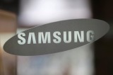 FILE - This Wednesday, Oct. 5, 2016 file photo shows the corporate logo of Samsung Electronics Co. at its shop in Seoul, ...