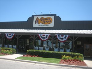 The Cracker Barrel off Interstate 35 in San Antonio, Texas. Cracker Barrel Old Country Store, Inc., is a chain of "Old Country Stores," each combining a retail store and a restaurant.