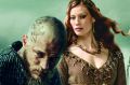 Travis Fimmel (Ragnar) and Alyssa Sutherland (Queen Aslaug) in <i>Vikings</i>.