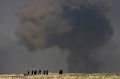 A large cloud of smoke rises during fighting between Iraqi security forces and Islamic State militants in early March.