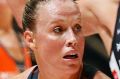 MELBOURNE, AUSTRALIA - MARCH 04: Kim Green of the Giants makes a pass during the round three Super Netball match between ...