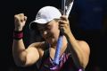 Barty celebrates after winning the Malaysian Open final.