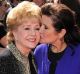 Debbie Reynolds and Carrie Fisher in 2011. 