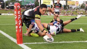 SYDNEY, AUSTRALIA - MARCH 24: Dallin Watene-Zelezniak of the Panthers scores a try during the round four NRL match ...