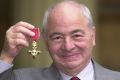 Writer Colin Dexter, who created music-loving Oxford detective Inspector Morse, after receiving the OBE in 2000.