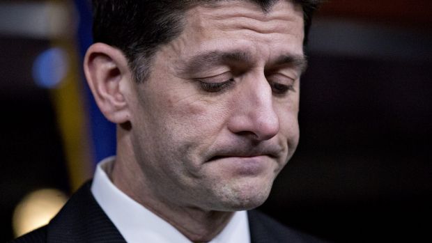 US House Speaker Paul Ryan pauses while speaking during a news conference after the bill was pulled.