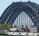 SHD. News. The Sydney Swans flag flies over the Harbour Bridge on the day of the AFL Grand Final, Sydney Swans vs ...