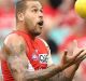 SYDNEY, AUSTRALIA - MARCH 25: Lance Franklin of the Swans marks during the round one AFL match between the Sydney Swans ...