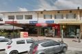 The Ainslie shops, showing Edgar's Inn and the buildings at 3 and 5 Edgar Street, where loose asbestos was found in the ...