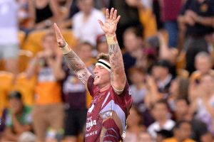 BRISBANE, AUSTRALIA - MARCH 24: Josh McGuire of the Broncos celebrates victory after the round four NRL match between ...