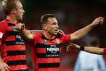 SYDNEY, AUSTRALIA - MARCH 24: Brendon Santalab of the Wanderers (R) celebrates with Mitch Nichols (L) after scoring a ...