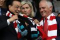 Chinese Premier Li Keqiang and Prime Minister Malcolm Turnbull share a joke before kick-off at Sydney Cricket Ground.