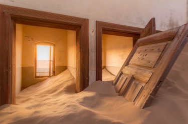 Kolmanskop is a ghost town in the Namib desert in southern Namibia.The effects of wind, sand and time allow the creation ...