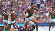NEWCASTLE, AUSTRALIA - MARCH 18:  Sam Burgess of the Rabbitohs is tackled during the round three NRL match between the ...