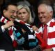 Chinese Premier Li Keqiang and Prime Minister Malcolm Turnbull share a joke before kick-off at Sydney Cricket Ground.