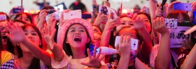 Chinese fans cheer during a concert by South Korean K-Pop group Winner in Shanghai. Would that a Chinese pop group could ...