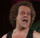 Richard Simmons speaks to the audience before the start of a summer salad fashion show at Grand Central Terminal in New ...