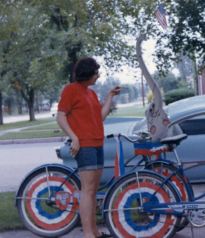 The author prepares to ride her decorated bicycle with a contingent of Teen Age Republicans (TARs) in the Colorado State Fair Parade, circa 1964