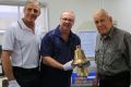 From left, Cr Tim Dwyer, Landsborough Historical Society Management Committee member Tim Venter and Peter Olds with one ...