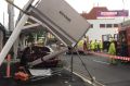 A crane was called to the scene to stabilise the overhead walkway.