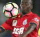 Papa Babacar Diawara of Adelaide controls the ball.