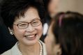 Hong Kong's new chief executive and former chief secretary Carrie Lam outside a polling station for the chief executive ...