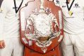 Peter Handscomb, Scott Boland and Marcus Stoinis of the Bushrangers with the Sheffield Shield after beating South ...