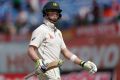 Australia's captain Steven Smith leaves ground after his dismissal for 111 by India's Ravichandran Ashwin during the ...