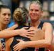 SYDNEY, AUSTRALIA - MARCH 26: Caitlin Thwaites of the Magpies embraces teammate Cody Lange after the round six Super ...