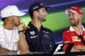 Mercedes driver Lewis Hamilton, (left), Australia's Red Bull driver Daniel Ricciardo, and Ferrari driver Sebastian ...