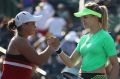 Run continues: Canada's Eugenie Bouchard congratulates Ashleigh Barty after the Australian won in three sets in the ...