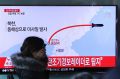A TV news program reports North Korea's recent missile launch in Seoul, South Korea.