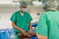 Neurosurgeon John Ruge examines Dominique before her surgery at Advocate Children's Hospital in Chicago. 