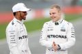 Lewis Hamilton and his new Mercedes GP teammate, Valtteri Bottas of Finland, share a joke.
